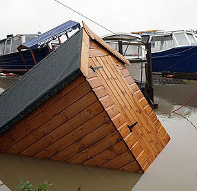 Sunken wooden garden shed