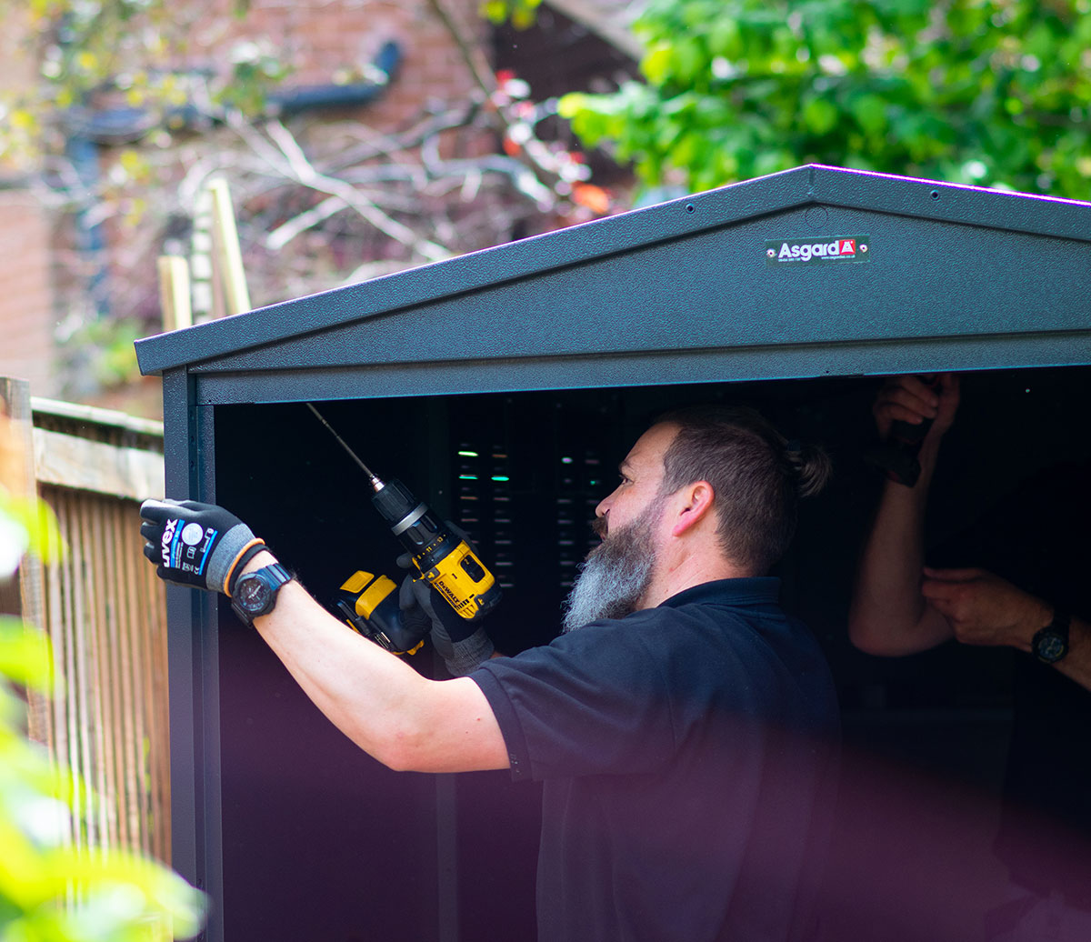 Asgard bike shed installation for Olympic Triathlete Non Stanford and Aaron Royle