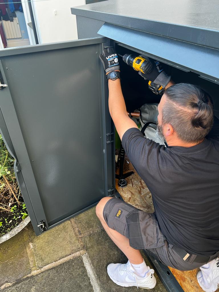 Asgard Shed Installation Team fixing an Asgard Metalshed