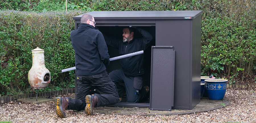 Asgard bike shed installation team