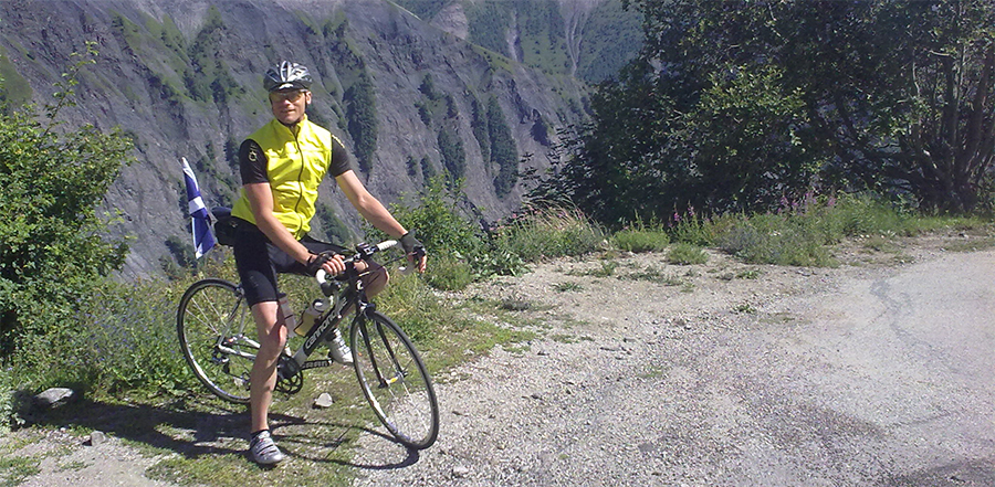 Asgard's Andy cycling on the Alps