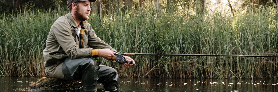 Angler with fishing equipment