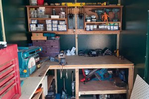 Customers workshop shed with bench table