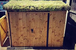 Customer's Asgard metal shed with bespoke wooden cladding