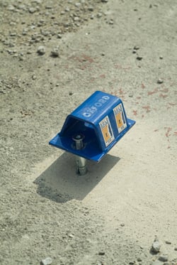 Fitting a ground anchor knocking in Fitting a ground anchor knocking in