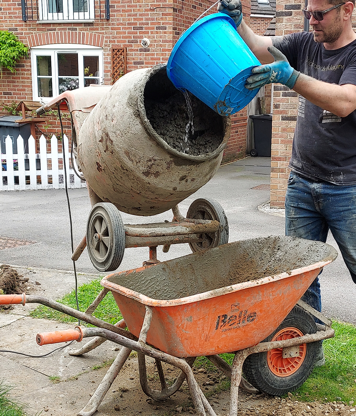 Mixing concrete for a shed base