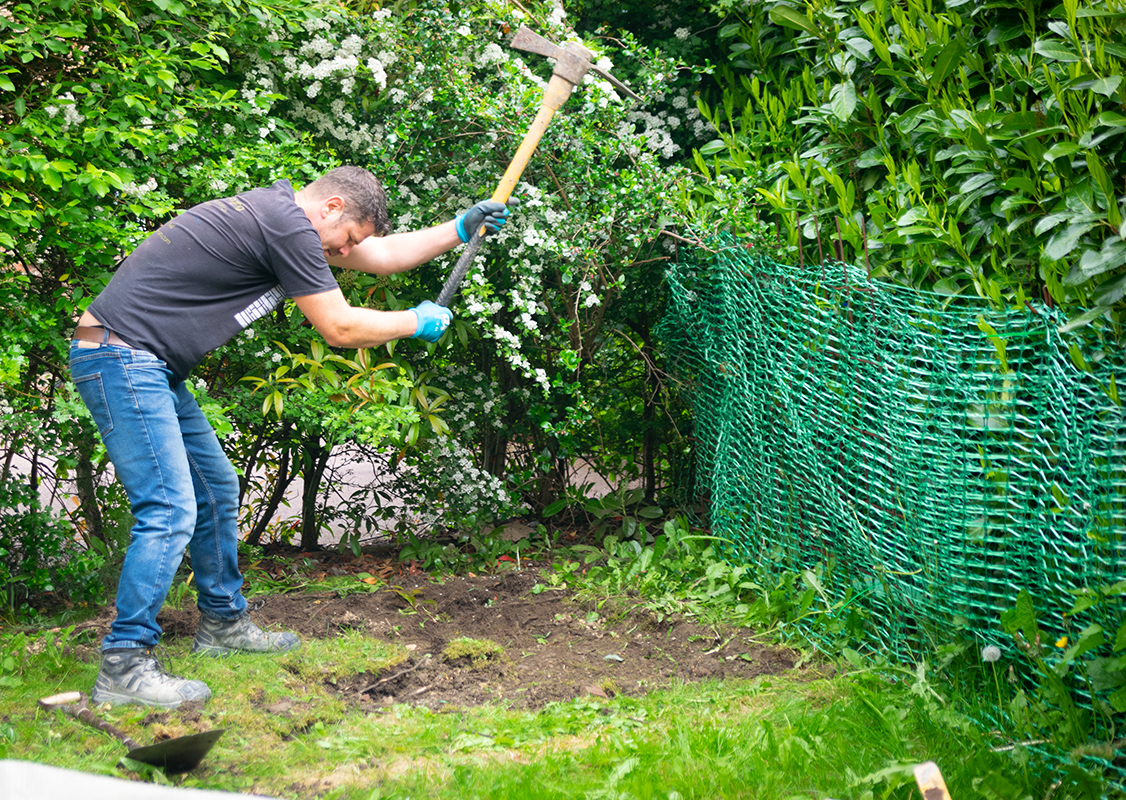 Digging a base for a metal shed