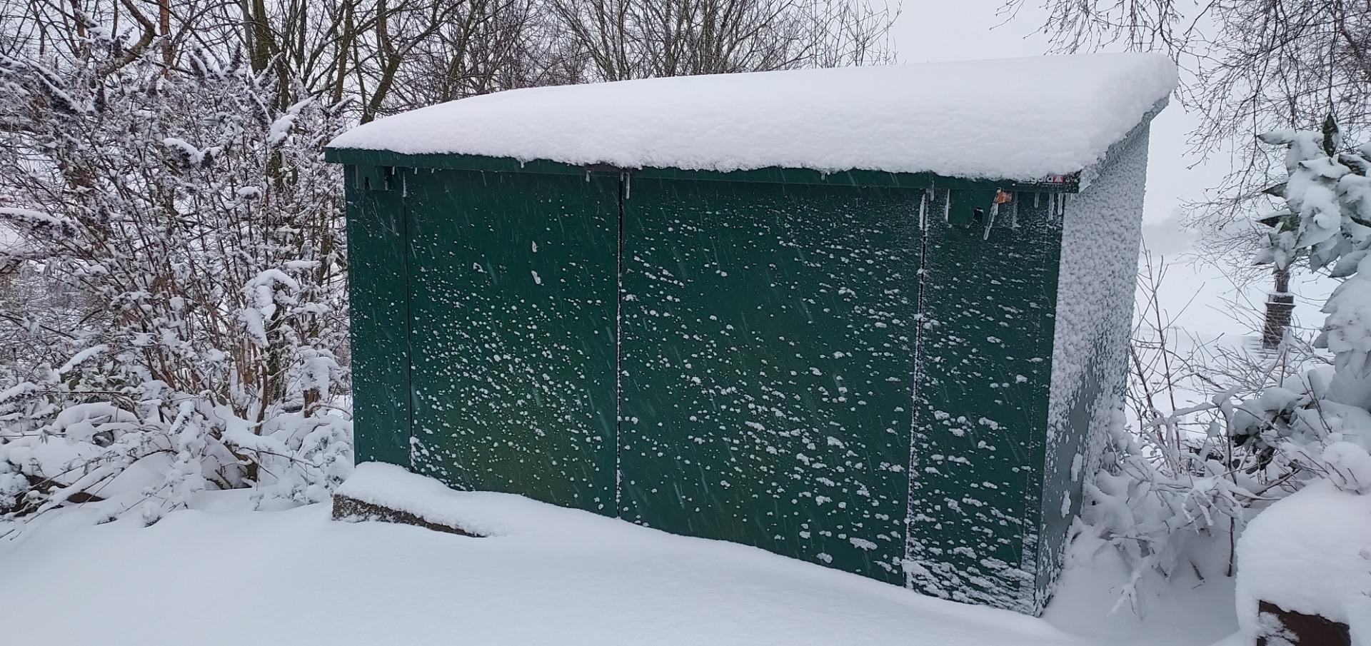 Snow and Metal Sheds