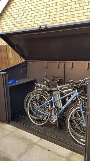 Access bike storage shed with lift up lid
